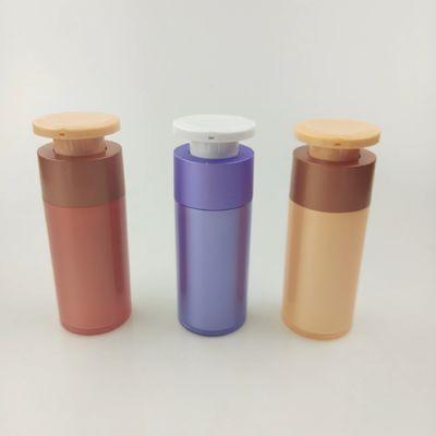 흰색 푸시 다운 프레스 펌프와 함께 보라색 플라스틱 화장품 분배 병